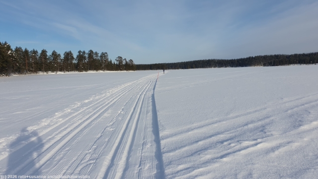 loipe aurinkolatu ja seipiniemi ueber den hossanjaervi bei hossa