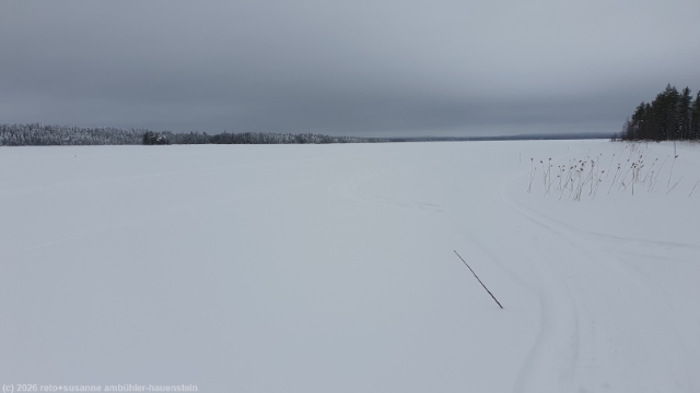 loipe posionjaerven aurinkolatu ueber den posionjaervi bei posio